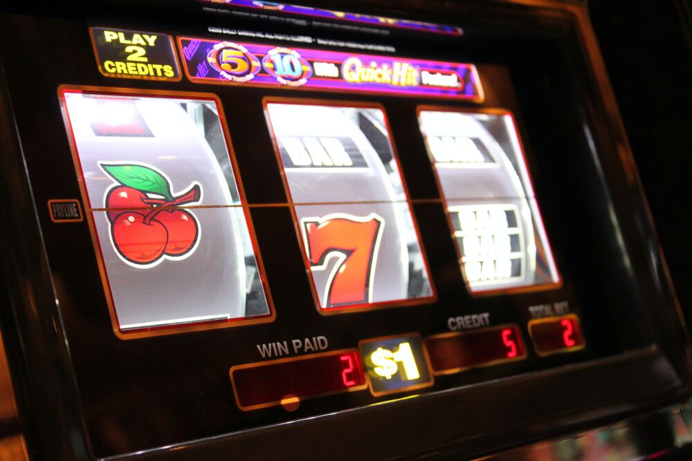 Slot machine showcasing various symbols on its spinning reels